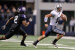 ARLINGTON, TX - OCTOBER 28:  Riley Nelson #13 of the BYU Cougars runs against Jason Verrett #2 of the TCU Horned Frogs at Cowboys Stadium on October 28, 2011 in Arlington, Texas. The TCU Horned Frogs defeated the BYU Cougars 38-28.  (Photo by Sarah Glenn/Getty Images)