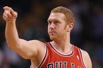 BOSTON, MA - JANUARY 13:  Brian Scalabrine #24 of the Chicago Bulls points to a teammate in the fourth quarter against the Boston Celtics on January 13, 2012 at TD Garden in Boston, Massachusetts. The Chicago Bulls defeated the Boston Celtics 79-88. NOTE TO USER: User expressly acknowledges and agrees that, by downloading and or using this photograph, User is consenting to the terms and conditions of the Getty Images License Agreement.  (Photo by Elsa/Getty Images)