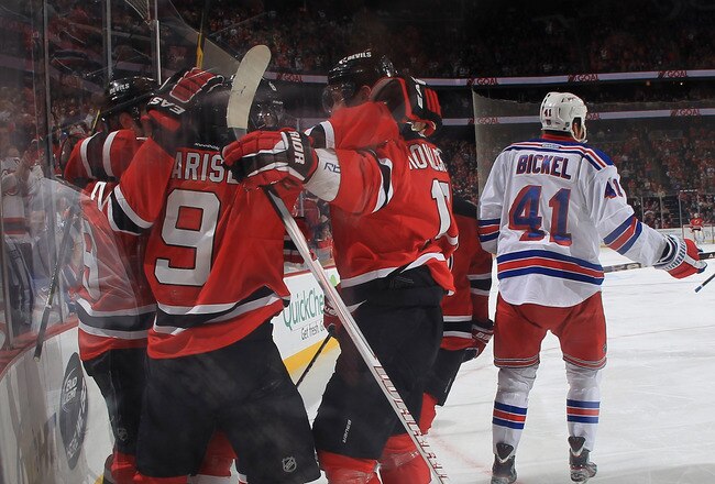 NEWARK, NJ - JANUARY 31:  Zach Parise #9 of the New Jersey Devils celebrates his goal at 8:20 of the second period against the New York Rangers at the Prudential Center on January 31, 2012 in Newark, New Jersey.  (Photo by Bruce Bennett/Getty Images)