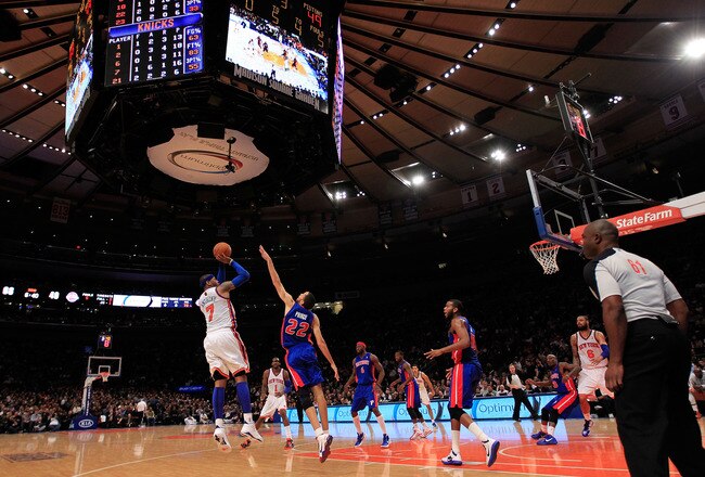 NEW YORK, NY - JANUARY 31:  Carmelo Anthony #7 of the New York Knicks shoots over Tayshaun Prince #22 of the Detroit Pistons at Madison Square Garden on January 31, 2012 in New York City.  NOTE TO USER: User expressly acknowledges and agrees that, by downloading and or using this photograph, User is consenting to the terms and conditions of the Getty Images License Agreement. (Photo by Chris Trotman/Getty Images)