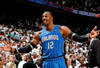 ATLANTA, GA - APRIL 22:  Dwight Howard #12 of the Orlando Magic reacts after being called for a technical foul against the Atlanta Hawks during Game Three of the Eastern Conference Quarterfinals in the 2011 NBA Playoffs at Philips Arena on April 22, 2011 in Atlanta, Georgia.  (Photo by Kevin C. Cox/Getty Images)