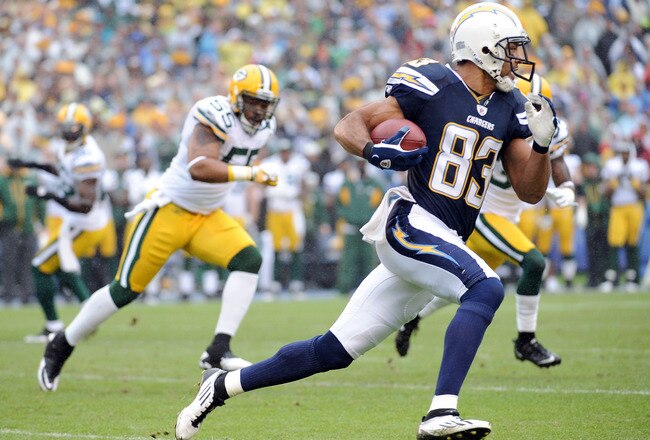 SAN DIEGO, CA - NOVEMBER 06:   Vincent Jackson #83 of the San Diego Chargers runs as Desmond Bishop #55 of the Green Bay Packers chases after a catch during the first quarter at Qualcomm Stadium on November 6, 2011 in San Diego, California.  (Photo by Harry How/Getty Images)