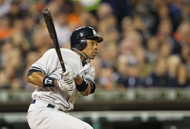 DETROIT, MI - OCTOBER 04:  Curtis Granderson #14 of the New York Yankees hits an RBI double against the Detroit Tigers in the fifth inning of Game Four of the American League Division Series at Comerica Park on October 4, 2011 in Detroit, Michigan.  (Photo by Leon Halip/Getty Images)