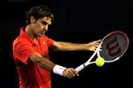 MELBOURNE, AUSTRALIA - JANUARY 26:  Roger Federer of Switzerland plays a backhand in his semifinal match against Rafael Nadal of Spain during day eleven of the 2012 Australian Open at Melbourne Park on January 26, 2012 in Melbourne, Australia.  (Photo by Quinn Rooney/Getty Images)