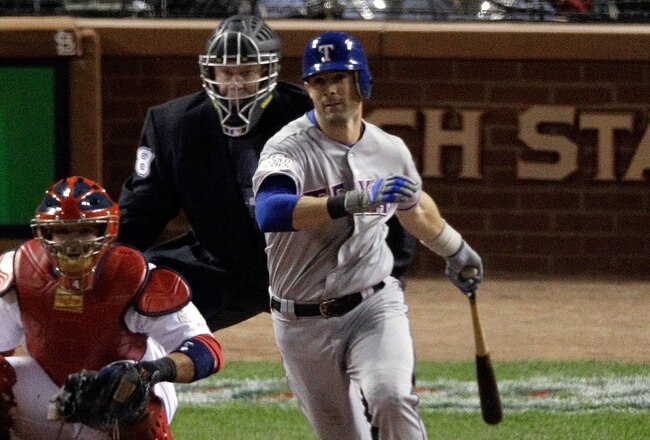 ST LOUIS, MO - OCTOBER 27: Michael Young #10 of the Texas Rangers hits a single to center off of Jaime Garcia #54 of the St. Louis Cardinals during Game Six of the MLB World Series at Busch Stadium on October 27, 2011 in St Louis, Missouri.  (Photo by Rob Carr/Getty Images)