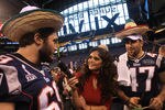 INDIANAPOLIS, IN - JANUARY 31:  Televisa reporter Marisol Gonzalez interviews Kyle Hix (L) #69 and Christian Cox #47 of the New England Patriots during Media Day ahead of Super Bowl XLVI against the New York Giants at Lucas Oil Stadium on January 31, 2012 in Indianapolis, Indiana.  (Photo by Scott Halleran/Getty Images)