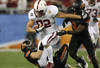 GLENDALE, AZ - JANUARY 02: Coby Fleener #82 of the Stanford Cardinal runs for yards after the catch against the Oklahoma State Cowboys during the Tostitos Fiesta Bowl on January 2, 2012 at University of Phoenix Stadium in Glendale, Arizona.  (Photo by Donald Miralle/Getty Images)