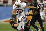 GLENDALE, AZ - JANUARY 02: Coby Fleener #82 of the Stanford Cardinal runs for yards after the catch against the Oklahoma State Cowboys during the Tostitos Fiesta Bowl on January 2, 2012 at University of Phoenix Stadium in Glendale, Arizona.  (Photo by Donald Miralle/Getty Images)
