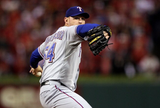 ST LOUIS, MO - OCTOBER 28:  Matt Harrison #54 of the Texas Rangers pitches in the fourth inning during Game Seven of the MLB World Series against the St. Louis Cardinals at Busch Stadium on October 28, 2011 in St Louis, Missouri.  (Photo by Ezra Shaw/Getty Images)