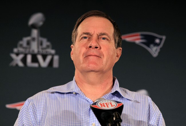 INDIANAPOLIS, IN - FEBRUARY 01:  Head coach Bill Belichick of the New England Patriots looks on while he answers questions from the press during a media availability session for Super Bowl XLVI at the University Place Conference Center & Hotel on February 1, 2012 in Indianapolis, Indiana.  (Photo by Scott Halleran/Getty Images)
