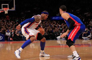 NEW YORK, NY - JANUARY 31:  Carmelo Anthony #7 of the New York Knicks drives against Austin Daye #5 of the Detroit Pistons at Madison Square Garden on January 31, 2012 in New York City.  NOTE TO USER: User expressly acknowledges and agrees that, by downloading and or using this photograph, User is consenting to the terms and conditions of the Getty Images License Agreement. (Photo by Chris Trotman/Getty Images)