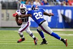 EAST RUTHERFORD, NJ - OCTOBER 16:  C.J. Spiller #28 of the Buffalo Bills runs the ball against  Antrel Rolle #26 of the New York Giants at MetLife Stadium on October 16, 2011 in East Rutherford, New Jersey.  (Photo by Chris Trotman/Getty Images)