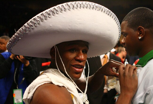 LAS VEGAS - MAY 05:  Floyd Mayweather Jr. celebrates his split decision victory against Oscar De La Hoya after their WBC super welterweight championship fight at the MGM Grand Garden Arena May 5, 2007 in Las Vegas, Nevada.  (Photo by Al Bello/Getty Images)