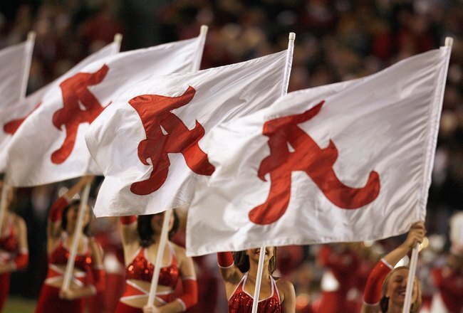 TUSCALOOSA, AL - NOVEMBER 15: The flag girls of the Alabama Crimson Tide marching band perform before the game against the Mississippi State Bulldogs at Bryant-Denny Stadium on November 15, 2008 in Tuscaloosa, Alabama. (Photo by Kevin C. Cox/Getty Images)