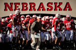 LINCOLN, NE - OCTOBER 30: Coach Bo Pelini  leads his Nebraska Cornhusker football team on the field against the Missouri Tigers at Memorial Stadium on October 30, 2010 in Lincoln, Nebraska. Nebraska Defeated Missouri 31-17. (Photo by Eric Francis/Getty Images)