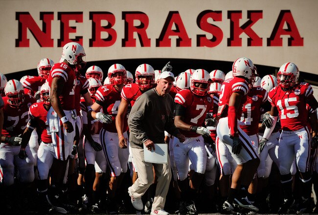 LINCOLN, NE - OCTOBER 30: Coach Bo Pelini  leads his Nebraska Cornhusker football team on the field against the Missouri Tigers at Memorial Stadium on October 30, 2010 in Lincoln, Nebraska. Nebraska Defeated Missouri 31-17. (Photo by Eric Francis/Getty Images)