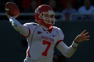 DALLAS, TX - JANUARY 02:  Case Keenum #7 of the Houston Cougars throws against the Penn State Nittany Lions during the TicketCity Bowl at Cotton Bowl Stadium on January 2, 2012 in Dallas, Texas.  (Photo by Ronald Martinez/Getty Images)