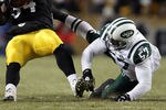 PITTSBURGH, PA - JANUARY 23:  Rashard Mendenhall #34 of the Pittsburgh Steelers runs down field against Bart Scott #57 of the New York Jets  during the 2011 AFC Championship game at Heinz Field on January 23, 2011 in Pittsburgh, Pennsylvania.  (Photo by Al Bello/Getty Images)