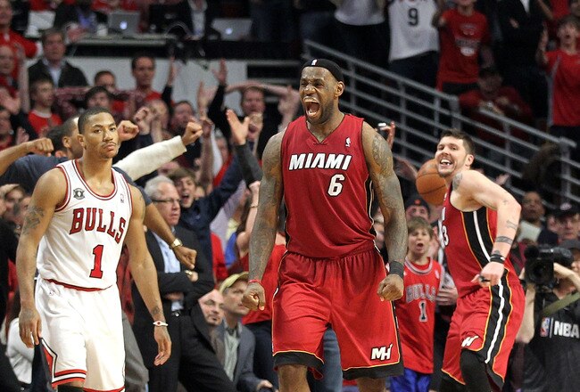 CHICAGO, IL - MAY 26:  LeBron James #6 and Mike Miller #13 of the Miami Heat celebrate after they won 83-80 against Derrick Rose #1 (L) of the Chicago Bulls in Game Five of the Eastern Conference Finals during the 2011 NBA Playoffs on May 26, 2011 at the United Center in Chicago, Illinois. NOTE TO USER: User expressly acknowledges and agrees that, by downloading and or using this photograph, User is consenting to the terms and conditions of the Getty Images License Agreement.  (Photo by Mike Ehrmann/Getty Images)