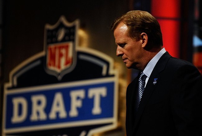 NEW YORK - APRIL 22:  NFL Commissioner Roger Goodell looks on as he stands on stage during the first round of the 2010 NFL Draft at Radio City Music Hall on April 22, 2010 in New York City.  (Photo by Jeff Zelevansky/Getty Images)