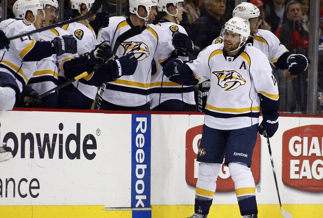 COLUMBUS, OH - JANUARY 19:  Mike Fisher #12 of the Nashville Predators celebrates a goal during the game against the Columbus Blue Jackets at Nationwide Arena on January 19, 2012 in Columbus, Ohio.  The Predators defeated the Blue Jackets 3-0.  (Photo by John Grieshop/Getty Images)