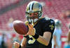 TAMPA, FL - OCTOBER 16:  Quarterback Drew Brees #9 of the New Orleans Saints warms up for play against the Tampa Bay Buccaneers October 16, 2011 at Raymond James Stadium in Tampa, Florida. (Photo by Al Messerschmidt/Getty Images)