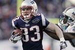 FOXBORO, MA - DECEMBER 24:  Wes Welker #83 of the New England Patriots runs past  Yeremiah Bell #37 of the Miami Dolphins during the fourth quarterof New England's 27-24 win at Gillette Stadium on December 24, 2011 in Foxboro, Massachusetts.  (Photo by Winslow Townson/Getty Images)