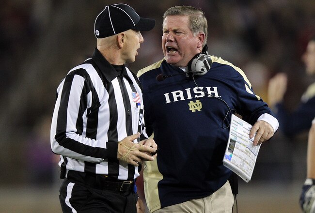 STANFORD, CA - NOVEMBER 26:  Notre Dame Fighting Irish head coach Brian Kelly argues a call with side judge Glenn Crowther during their game against the Stanford Cardinal at Stanford Stadium on November 26, 2011 in Stanford, California.  (Photo by Ezra Shaw/Getty Images)