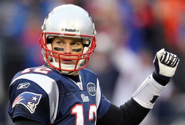 FOXBORO, MA - JANUARY 22:  Tom Brady #12 of the New England Patriots looks on behind the line of scrimage against the Baltimore Ravens during their AFC Championship Game at Gillette Stadium on January 22, 2012 in Foxboro, Massachusetts.  (Photo by Jim Rogash/Getty Images)