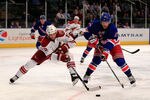 NEW YORK, NY - JANUARY 10: (L) Boyd Gordon #15 of the Phoenix Coyotes skates against (R) Marc Staal #18 of the New York Rangers at Madison Square Garden on January 10, 2012 in New York City.  (Photo by Chris Trotman/Getty Images)