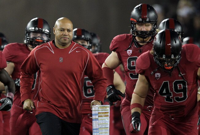 STANFORD, CA - NOVEMBER 26:  Stanford Cardinal head coach David Shaw runs on to the field for their game against the Notre Dame Fighting Irish at Stanford Stadium on November 26, 2011 in Stanford, California.  (Photo by Ezra Shaw/Getty Images)