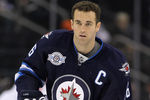 WINNIPEG, CANADA - JANUARY 21: Andrew Ladd #16 of the Winnipeg Jets warms up on the ice before a game against the Florida Panthers in NHL action at the MTS Centre on January 21, 2012 in Winnipeg, Manitoba, Canada. (Photo by Marianne Helm/Getty Images)