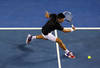 MELBOURNE, AUSTRALIA - JANUARY 29:  Novak Djokovic of Serbia plays a backhand in his men's final match against Rafael Nadal of Spain during day fourteen of the 2012 Australian Open at Melbourne Park on January 29, 2012 in Melbourne, Australia.  (Photo by Cameron Spencer/Getty Images)