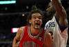 CHICAGO, IL - MARCH 28: Joakim Noah #13 of the Chicago Bulls moves against Elton Brand #42 of the Philadelphia 76ers at the United Center on March 28, 2011 in Chicago, Illinois. The 76ers defeated the Bulls 97-85. NOTE TO USER: User expressly acknowledges and agrees that, by downloading and/or using this photograph, User is consenting to the terms and conditions of the Getty Images License Agreement.  (Photo by Jonathan Daniel/Getty Images)
