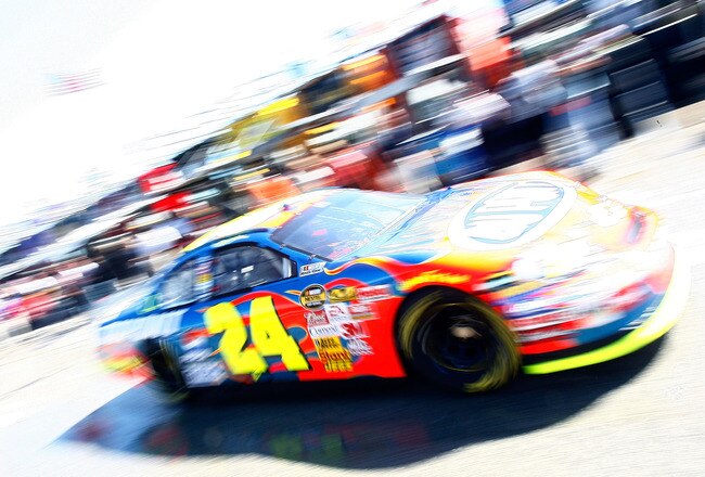 HOMESTEAD, FL - NOVEMBER 16:  Jeff Gordon, driver of the #24 DuPont Chevrolet, drives in the garage area during practice for the NASCAR Nextel Cup Series Ford 400 at Homestead-Miami Speedway on November 16, 2007 in Homestead, Florida.  (Photo by Chris Graythen/Getty Images)
