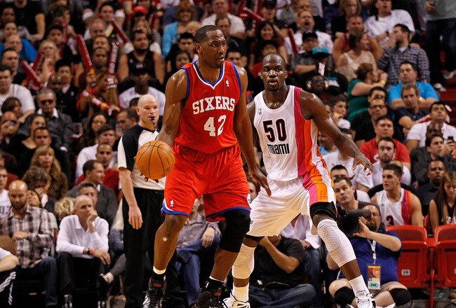 MIAMI, FL - JANUARY 21: Elton Brand #42 of the Philadelphia 76ers is guarded by Joel Anthony #50 of the Miami Heat during a game  at American Airlines Arena on January 21, 2012 in Miami, Florida. NOTE TO USER: User expressly acknowledges and agrees that, by downloading and/or using this Photograph, User is consenting to the terms and conditions of the Getty Images License Agreement.  (Photo by Mike Ehrmann/Getty Images)