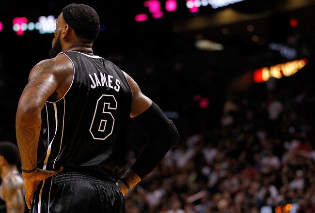MIAMI, FL - JANUARY 29:  LeBron James #6 of the Miami Heat looks on during a game against the Chicago Bulls at American Airlines Arena on January 29, 2012 in Miami, Florida. NOTE TO USER: User expressly acknowledges and agrees that, by downloading and/or using this Photograph, User is consenting to the terms and conditions of the Getty Images License Agreement.  (Photo by Mike Ehrmann/Getty Images)