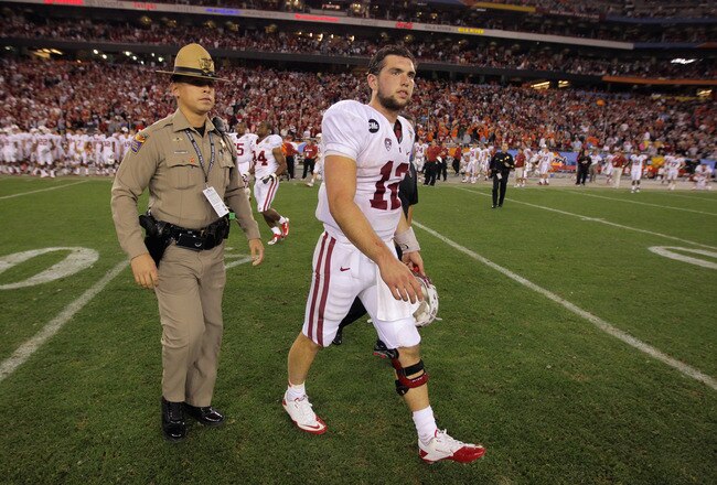 GLENDALE, AZ - JANUARY 02:  Andrew Luck #12 of the Stanford Cardinal walks off of the field after Stanford lost 41-38 in overtime against the Oklahoma State Cowboys during the Tostitos Fiesta Bowl on January 2, 2012 at University of Phoenix Stadium in Glendale, Arizona.  (Photo by Doug Pensinger/Getty Images)