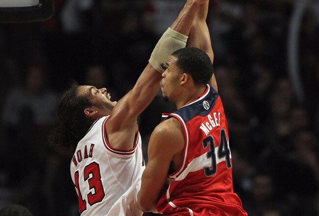 CHICAGO, IL - JANUARY 11: JaVale McGee #34 of the Washington Wizards shoots over Joakim Noah #13 of the Chicago Bulls at the United Center on January 11, 2012 in Chicago, Illinois. The Bulls defeated the Wizards 78-64. NOTE TO USER: User expressly acknowledges and agrees that, by downloading and or using this photograph, User is consenting to the terms and conditions of the Getty Images License Agreement. (Photo by Jonathan Daniel/Getty Images)