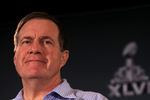 INDIANAPOLIS, IN - FEBRUARY 01:  Head coach Bill Belichick of the New England Patriots looks on while he answers questions from the press during a media availability session for Super Bowl XLVI at the University Place Conference Center & Hotel on February 1, 2012 in Indianapolis, Indiana.  (Photo by Scott Halleran/Getty Images)