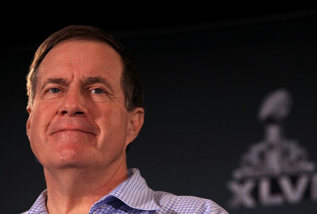 INDIANAPOLIS, IN - FEBRUARY 01:  Head coach Bill Belichick of the New England Patriots looks on while he answers questions from the press during a media availability session for Super Bowl XLVI at the University Place Conference Center & Hotel on February 1, 2012 in Indianapolis, Indiana.  (Photo by Scott Halleran/Getty Images)