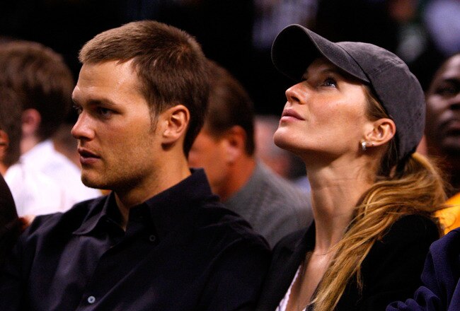 BOSTON - MAY 22:  Tom Brady of the New England Patriots and Gisele Bundchen watch as the Detroit Pistons play against the Boston Celtics during Game Two of the 2008 NBA Eastern Conference finals at the TD Banknorth Garden on May 22, 2008 in Boston, Massachusetts. NOTE TO USER: User expressly acknowledges and agrees that, by downloading and or using this photograph, User is consenting to the terms and conditions of the Getty Images License Agreement  (Photo by Jim Rogash/Getty Images)