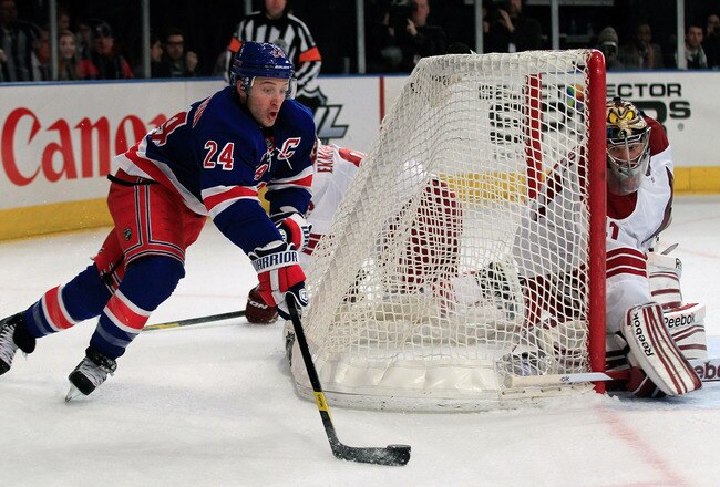NEW YORK, NY - JANUARY 10: (L) Ryan Callahan #24 of the New York Rangers prepares to shoot against (R) Mike Smith #41 of the Phoenix Coyotes at Madison Square Garden on January 10, 2012 in New York City.  (Photo by Chris Trotman/Getty Images)