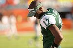 MIAMI GARDENS, FL - JANUARY 01:  Plaxico Burress #17 of the New York Jets looks on during a game against the Miami Dolphins at Sun Life Stadium on January 1, 2012 in Miami Gardens, Florida.  (Photo by Mike Ehrmann/Getty Images)