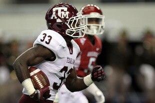 ARLINGTON, TX - OCTOBER 01:  Christine Michael #33 of the Texas A&M Aggies runs for a touchdown against the Arkansas Razorbacks at Cowboys Stadium on October 1, 2011 in Arlington, Texas.  (Photo by Ronald Martinez/Getty Images)