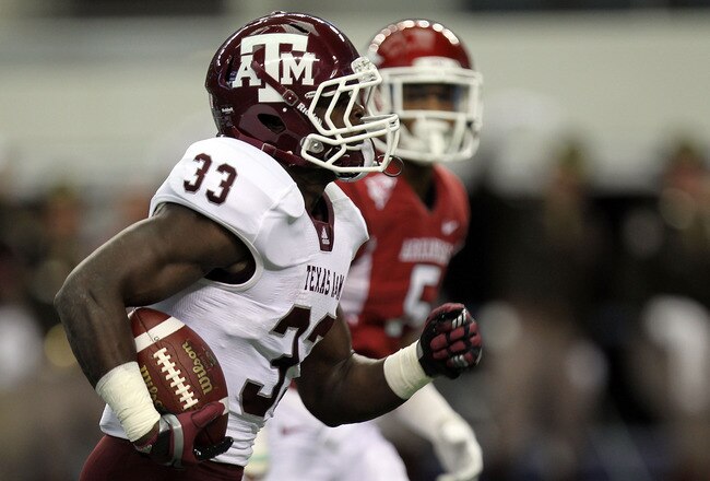 ARLINGTON, TX - OCTOBER 01:  Christine Michael #33 of the Texas A&M Aggies runs for a touchdown against the Arkansas Razorbacks at Cowboys Stadium on October 1, 2011 in Arlington, Texas.  (Photo by Ronald Martinez/Getty Images)
