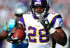 CHARLOTTE, NC - OCTOBER 30: Adrian Peterson #28 of the Minnesota Vikings runs with a catch for a touchdown against the Carolina Panthers at Bank of America Stadium on October 30, 2011 in Charlotte, North Carolina. (Photo by Scott Cunningham/Getty Images)