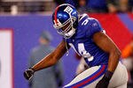 EAST RUTHERFORD, NJ - JANUARY 01:   Mathias Kiwanuka #94 of the New York Giants reacts after making a tackle for a lose against the Dallas Cowboys at MetLife Stadium on January 1, 2012 in East Rutherford, New Jersey.  (Photo by Rich Schultz/Getty Images)