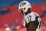 MIAMI GARDENS, FL - JANUARY 01:   Plaxico Burress #17 of the New York Jets looks on during a game against the Miami Dolphins at Sun Life Stadium on January 1, 2012 in Miami Gardens, Florida.  (Photo by Mike Ehrmann/Getty Images)