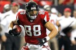 ATLANTA, GA - JANUARY 01:  Tony Gonzalez #88 of the Atlanta Falcons pulls in this reception against Ronde Barber #20 of the Tampa Bay Buccaneers at Georgia Dome on January 1, 2012 in Atlanta, Georgia.  (Photo by Kevin C. Cox/Getty Images)